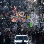 美国活动人士筹划五一“经济停摆”行动：呼吁不上学、不上班、不购物