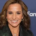 迪安娜·鲁西尼因与爱国者主教练合影后辞职