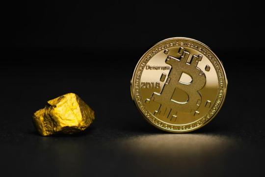 摩根大通：ETF资金流出与流动性趋紧拖累金银，比特币资金流更稳